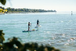 Erlebnisse im Juli: Bierseelig, Schnuppersegeln und Sup-Tour zur Mainau