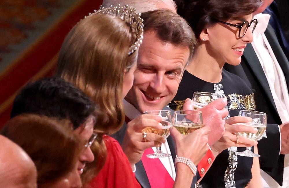 Präsident Emmanuel Macron zwinkerte Catherine, Prinzessin von Wales, bei ihrem Treffen auf Schloss Windsor zu.