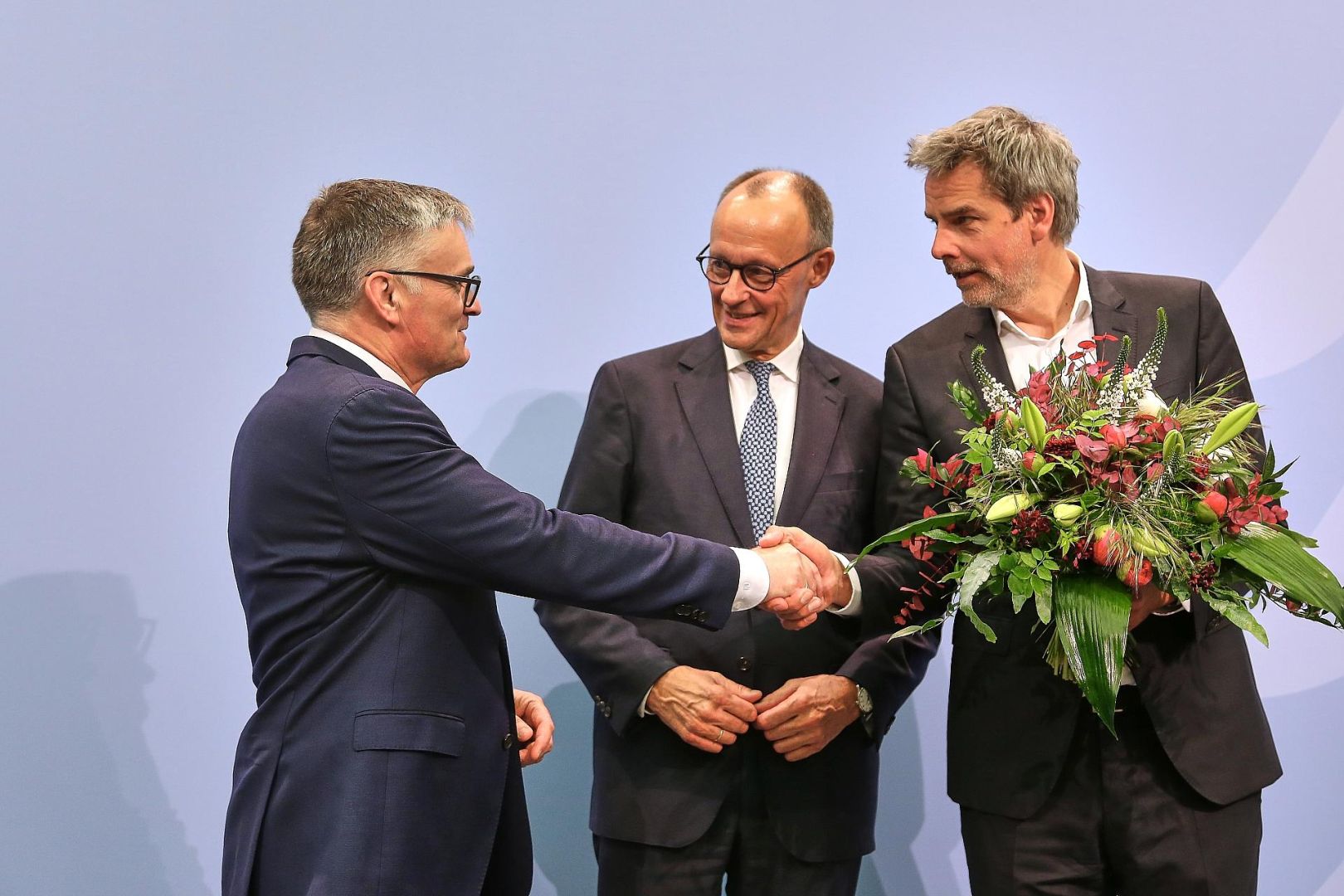 Stefan Kornelius, Friedrich Merz, Steffen Hebestreit am 12.05.2025